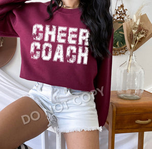 Cheer coach